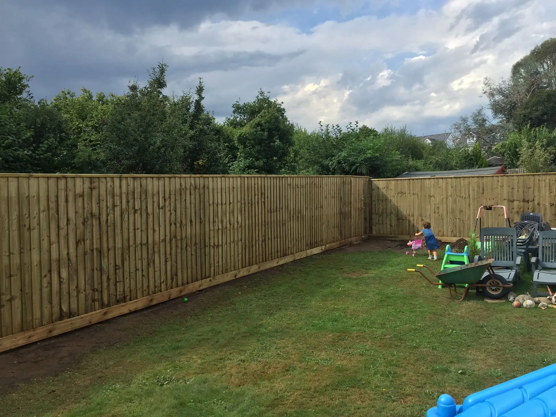 Close board garden fence installed along a family garden boundary in Newton Abbot