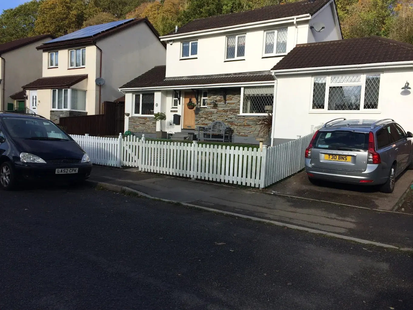 White picket fence along a front garden boundary in Newton Abbot